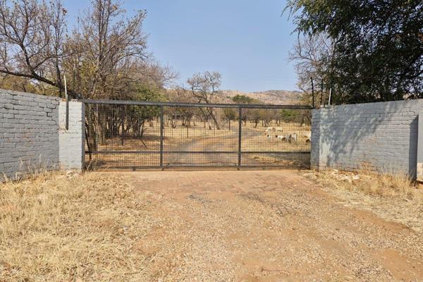 Nestled between Hartebeespoort and Pretoria North, this stunning 26-hectare farm offers a unique opportunity to own a piece of paradise ...