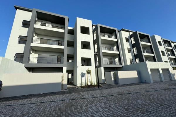 Step into modern living in Sandown, Blouberg! This brand-new development features three ...