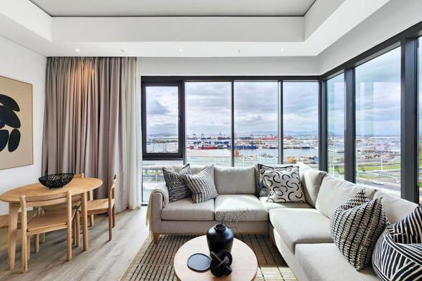 Discover luxury living in this stunning 2-bedroom corner apartment at Harbour Arch, Cape ...