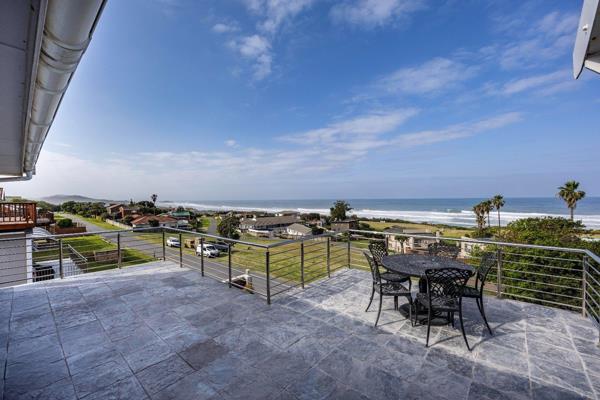 Nestled in a picturesque coastal locale, this stunning five-bedroom family abode features four ensuite bathrooms and an additional full ...