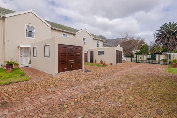 This serene and secure 2 bedroomed townhouse is located in the well maintained complex ...