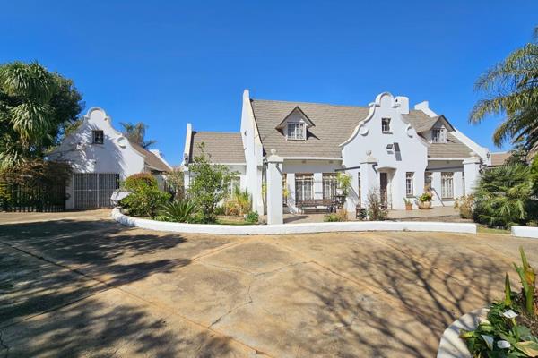 **EXCLUSIVE MANDATE**

Discover a rare gem in a peaceful neighborhood—a stunning property built in the iconic Cape Dutch style ...