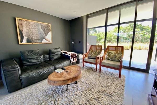 This contemporary two bedroom apartment, situated at The Woods, Elaleni Estate, offers secure and convenient living in a serene ...