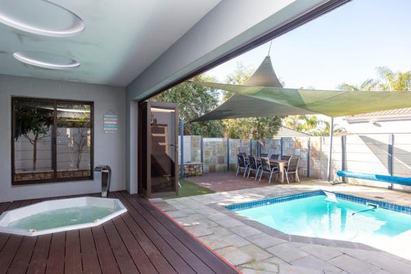 Welcome to this ultra-modern home in a cul-de-sac in Langeberg Heights close to all ...