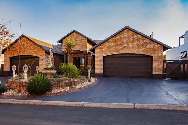 Nestled within the sought-after Ebotse Links Golf Estate, this exquisite residence ...