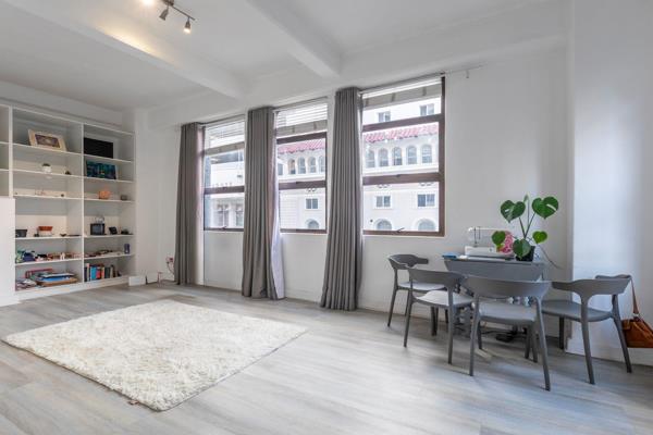 In a well-maintained block, you&#39;ll find a corner unit conveniently located on Hout Street. This unit features multiple exposure ...