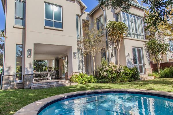 Experience the epitome of elegance and comfort in this spectacular home located in the ...