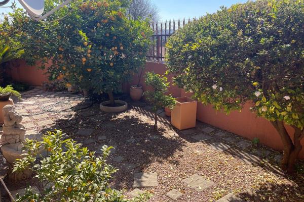 Stunning Views, Kumquats and Lemons Await in This Tranquil Townhouse!
This charming two-bedroom townhouse, priced to sell, is nestled ...