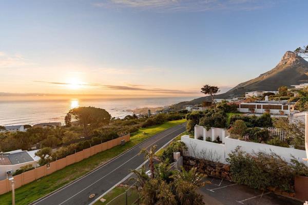 Perched high above vibrant Camps Bay, this top-floor apartment offers an unparalleled vantage point with extraordinary views of the ...