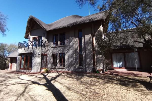 Nestled within the serene Vaal De Grace Nature Reserve, this exquisite double-storey home offers a harmonious blend of luxury and ...