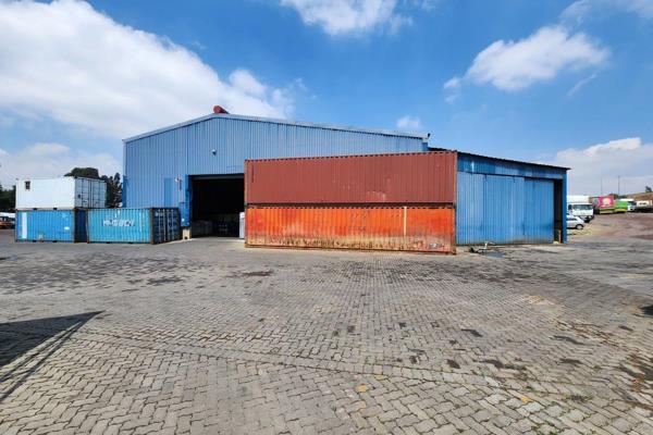 This expansive 8,000m&#178; warehouse with a large paved yard is available for lease in ...