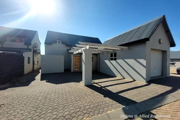 Experience the ultimate in luxury living with this exquisite 3-bedroom, 2.5-bathroom home, nestled in the sought-after Vulintaba ...