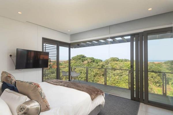 This beautiful 4-bedroom home is located in the modern Oceans Edge development of Zimbali. It offers lovely sea views from the main ...