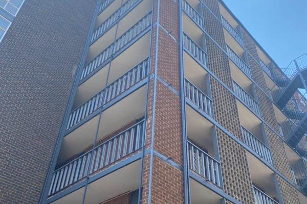 Situated in a secure and well-maintained building with 24/7 on-site security personnel, this apartment is an ideal living ...