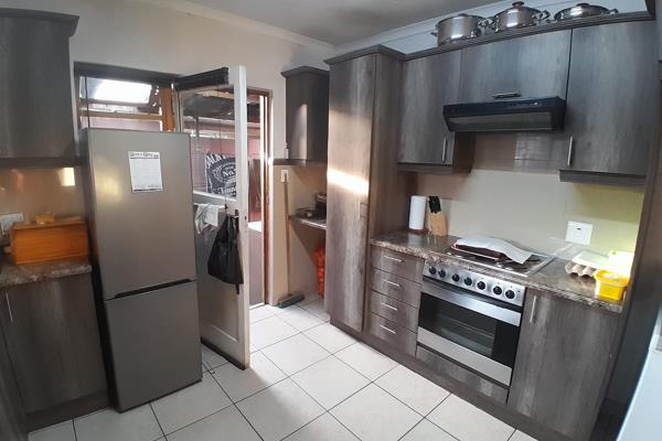 This family home with 2 separate flatlets offers a secure and serene lifestyle with easy ...