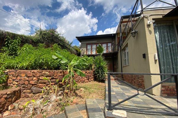 Beautiful double Storey house, plastered and painted brick construction , interrupted by a mixture of steel and aluminum framed windows ...