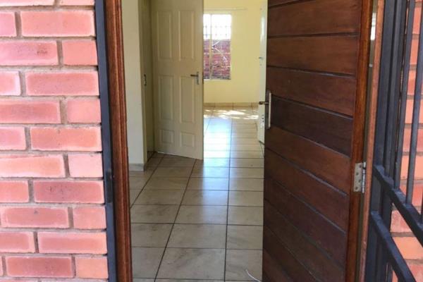 Double story semi attached townhouse. Down stairs two small living areas with kitchen ...