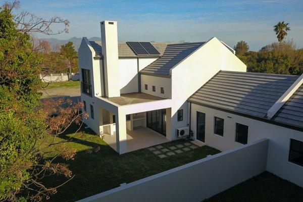 Located in an established and leavy suburb of Somerset West, this beautiful brand-new ...