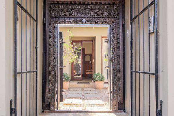 Perfectly positioned in Norwood on the Houghton border! A magnificent Balinese door welcomes you into an enchanting front courtyard ...