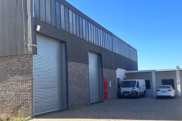 Exceptionally neat and spacious industrial property comprising of a warehouse and neat ...