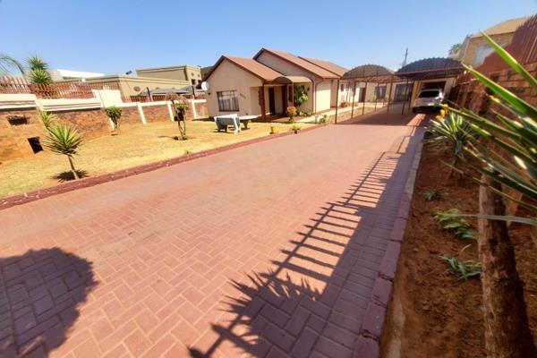 This charming family home,nestled in lenasia south ext3,offers comfort and convenience, situated within easy reach of highways,schools ...