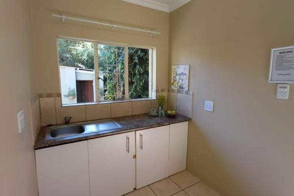 This bachelor flat features a small kitchen with space for a dining table,

1 bedroom with built-in cupboards
1 bathroom with a shower ...