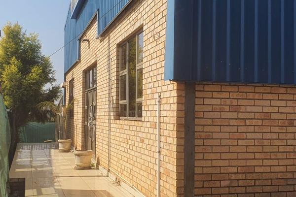 Commercial property with diverse uses consisting of two warehouses, offices, retail outlet and staff accommodation.