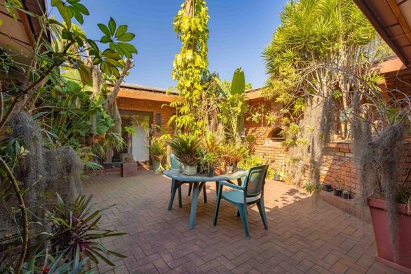 Set on almost level land is this spacious, low maintenance clinker brick home surrounded by lush vegetation. Perfect nature lovers ...