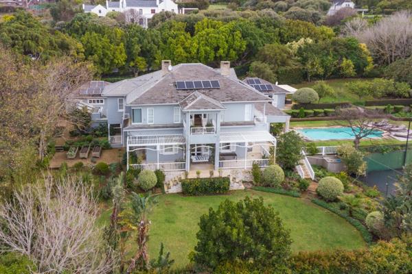 A Marthas Vineyard style home in the prestigious Avenues of Bel Ombre, Constantia, Cape Town. This meticulous home sprawls across an ...