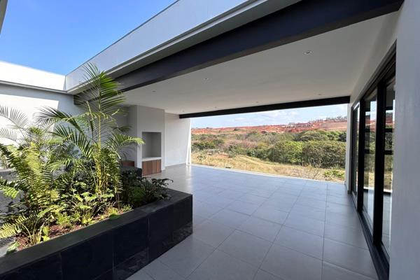 Set in the stunning Zululami Luxury Coastal Estate, this newly completed 4-bedroom home ...