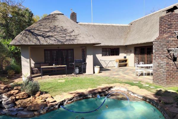 Four  bedroom home two bathrooms.
Open plan lounge Kitchen.
Patio to the pool, braai.
Main en suite with its own patio overlooking ...