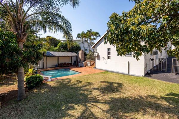 SOLE MANDATE | Four-bedroom home in Somerset Park, Umhlanga. This home comprises of an open plan dining and living room leading to the ...