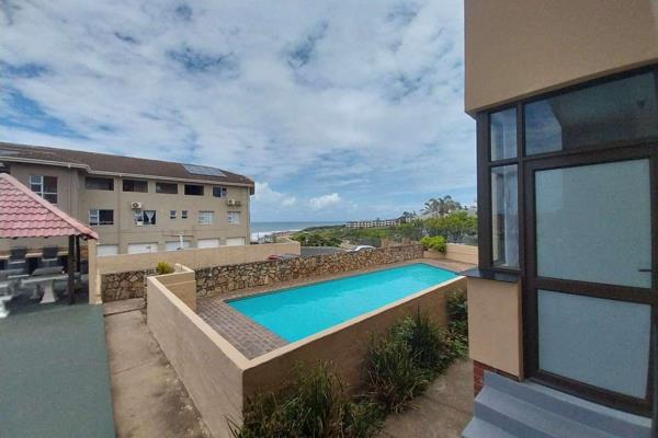 Sole Mandate! Neat, unfurnished bachelor unit located just a short stroll from Uvongo&#39;s main beach. It features an open-plan ...