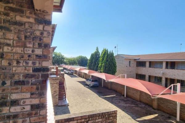 This spacious and thoughtfully laid-out apartment is situated in a well-maintained small security complex located within walking ...