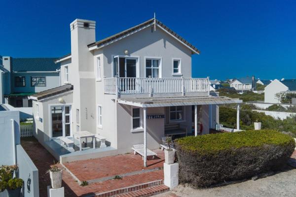 Nestled within the exclusive Private Beach Estate, this coastal haven offers an ...