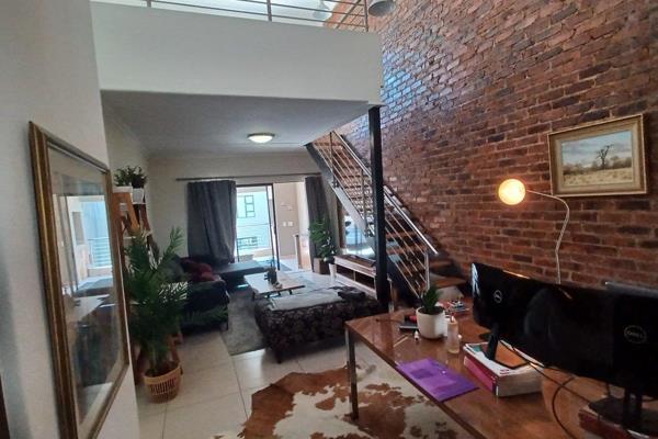 This modern &amp; sleek top floor 2-bedroom loft in the sought after urban oasis of ...