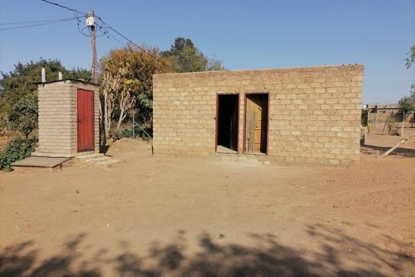 Stand available for sale in the above area

It offers two rooms,
An outside toilet, 
and water tap, it also goes with free bricks ...