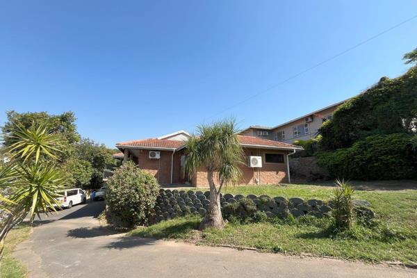 This tastefully designed home is situated in a quiet street in Westville

As you enter ...