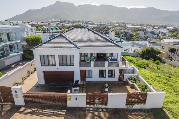 This family home is nestled between sea and mountains with views as far as the eye can ...