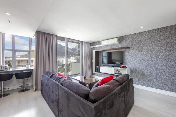 Experience the vibrant Cape Town lifestyle with this modern, fully furnished 1-bedroom apartment in the trendy De Waterkant area. Enjoy ...