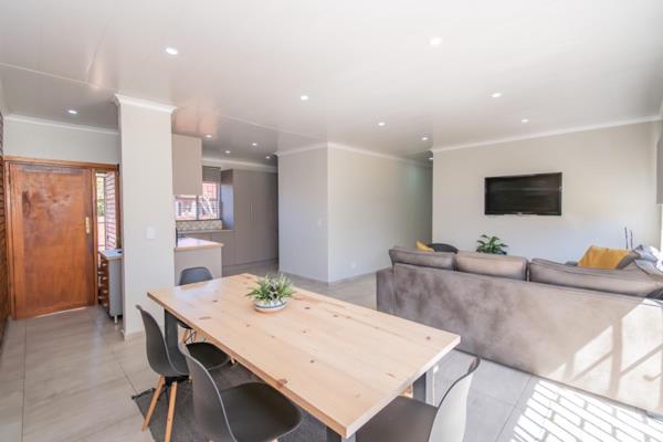 This stunning corner unit has it all! 

[Exclusive mandate].

Step inside to a welcoming open-plan dining and living area, perfect ...