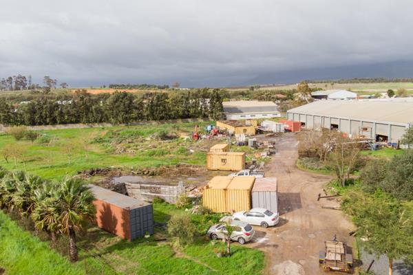 This expansive farm is situated in a prime location with growing industrial/commercial development, and it is in close proximity to major transportation routes presenting a significant opportunity for re-zoning into an industrial property. The property boasts a vast open ...