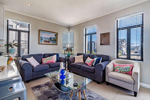 This corner apartment allows lots of natural light and offers an open plan living area which leads to the sunny balcony with a built-in ...