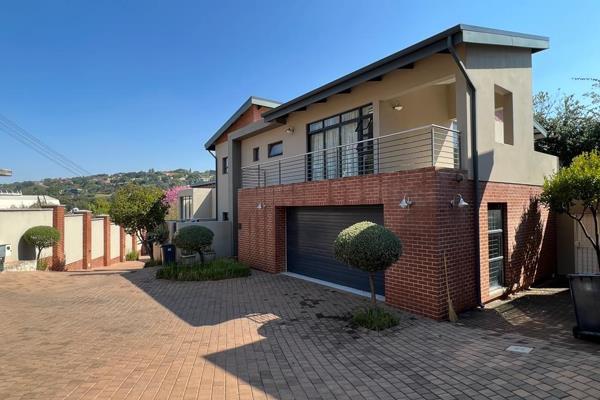 Nestled in the heart of Waterkloof, this stunning and spacious three-bedroom family unit is situated in a secure, gated complex ...