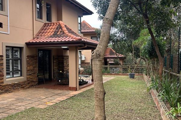 In the prestigious HillTop Estate Port Zimbali, this stunning 4-bedroom, 3.5-bathroom ...