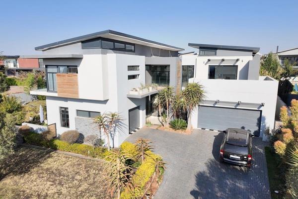 Come and view this Masterpiece with us, you will not be disappointed

Downstairs offers:
Double volume glass entrance hall
Open plan ...