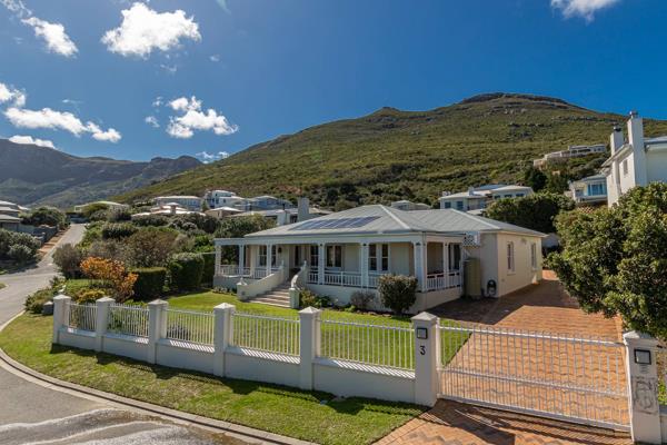 This spacious and inviting home offers breathtaking sea and mountain views from a wrap-around veranda, perfect for enjoying the ...