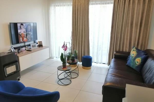 The apartment offers an open plan living area, dining room and kitchen (including: 3 eco-friendly appliances a washing machine and ...