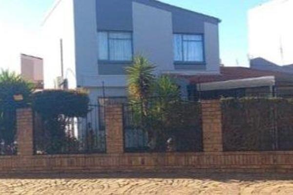 A typical 3-bedroom home in Lenasia Extension 9 feature the following:

1. **Living Area:** A spacious open-plan living room that ...