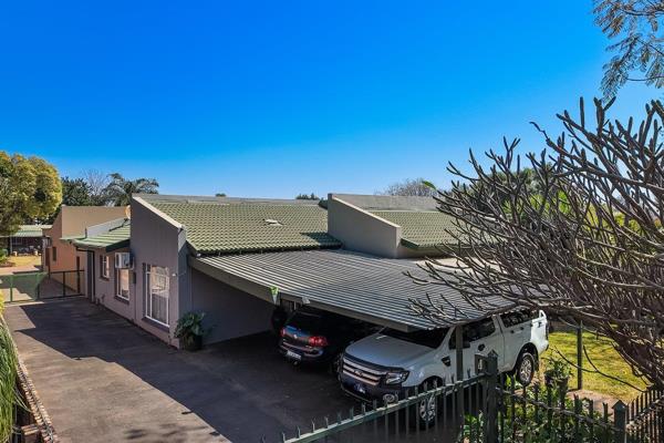 The property features two modern bathrooms: one equipped with a relaxing bathtub and the other with an en-suite shower for added ...